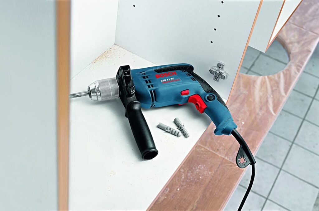 Bosch Professional Trapano con percussione GSB 13 RE (Motore da 600 Watt, incl. asta di profondità 210 mm, mandrino autoserrante 13 mm) [Classe di efficienza energetica B] - Immagine del prodotto.